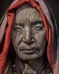 OLD PICTURES Looking through Old pictures embedded In my mind Old faces and  old places Of days long gone by Pictures of old English countryside And  cottage gardens true Portraits of famous