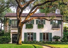 White stucco house with shutters. 8 Best Stucco Colors Perryman Painting Remodeling Inc