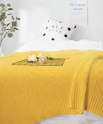 Brightly colored artwork and patterned textiles add contrast. Mustard Yellow Throw Blanket 50 X 60 Cotton Knitted Lightweight Throw For Sofa Couch Bed Decor Yellow Buy Online In Barbados At Barbados Desertcart Com Productid 212374553