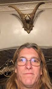 Hand carved deodar cedar bipod sculpture