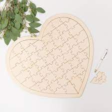 Add a personalised touch with an exquisite rustic wedding guest book delivered across australia. Wooden Heart Jigsaw Wedding Guest Book Weddingstar