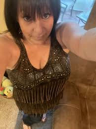 59 yrs simple girl with a simple smile. Single from California.