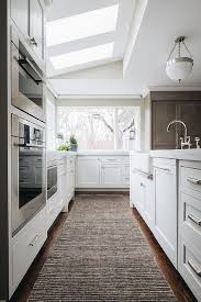 An elegant steel and black frame holds the kichler bensimone 43293 flush mount light securely in place, flush against the ceiling. Flush Mount Light Over Kitchen Sink Design Ideas