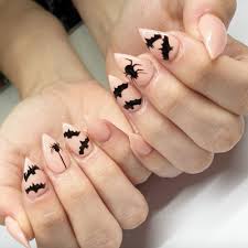 It suits women of all ages and can be used along with other colors like silver pretty easily. 42 Halloween Nail Art Ideas Cute Halloween Nail Designs Allure