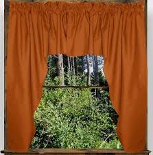Dress up windows with a valance. Solid Rust Colored Swag Window Valance Optional Center Piece Available