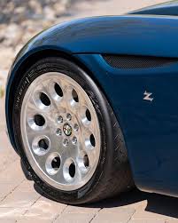 Image result for Rosso Competizione 2010 Alfa-Romeo