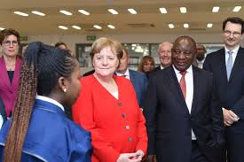 And she slammed conspiracy theorists. President Cyril Ramaphosa And German Chancellor Angela Merkel Meet The Engineers Of The Future At Bmw Group Plant Rosslyn