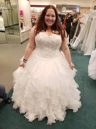 I used the body measurement chart (and a tape measure) to choose the correct sizing rather than trying to us Oleg Cassini Ruffled Skirt Plus Size Wedding Dress David S Bridal