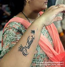 Name Tattoo Hand Tattoos For Guys Crown Tattoos For Women Name Tattoos On Wrist
