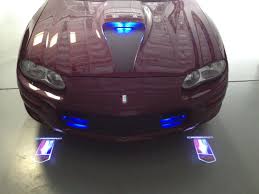 Led Logo Puddle Lights Installed In A 2002 Chevy Camaro Led Logo Dream Cars Chevy Camaro