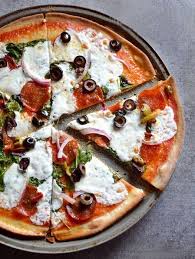 10 Secrets To Eat Pizza And Not Gain Extra Kilos Yes It Is Possible To Enjoy Without Gainin Crispy Pizza Crust Crispy Pizza Pizza Recipes Dough