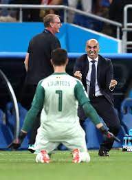 Roberto Martinez Head Coach Of Belgium And Thibaut Courtois Of Belgium Celebrate After Their Sides Third Goal Thibaut Courtois Japan World Cup Sport Outfit Men
