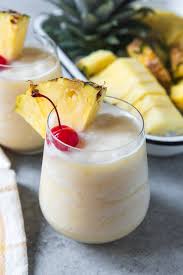 An Image Of A Non Alcoholic Pina Colada Recipe Made With Cream Of Coconut And Pineapple Juice Smoothie Recipes With Yogurt Pina Colada Non Alcoholic