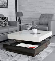 So there are a lot of different designs when it comes to this furniture piece. Buy Bentley Coffee Table In White Brown Colour By Home Centre Online Modern Rectangular Coffee Tables Tables Furniture Pepperfry Product