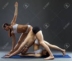 Check spelling or type a new query. Yoga Three Flexible People Posing In Difficult Asanas On Gray Background Stock Photo Picture And Royalty Free Image Image 39267656