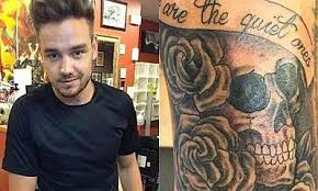 The arrows on his arm. Liam Payne Debuts Two New Tattoos After 22nd Birthday