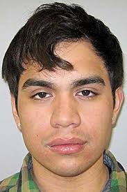 Sparta man charged with attempting to hit police officer