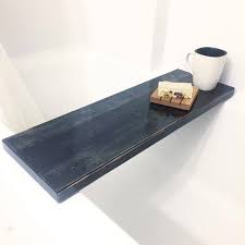 This is the ideal accessory for the most of aquatica's bathtubs, as it reflects the same interpretation of the function in cleverly designed and. Bathtub Table Resin Epoxy Rustic Black Bathtub Tray Bathroom Decor Gifts For The Home Designer Modern Farm Rustic Black Resin Furniture Bathtub Table