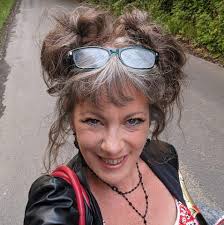 Hello fellow gardeners. This is sort of a gardening query so please forgive  me if it isn't the place to ask I imagine many of you out there have dogs?  We have