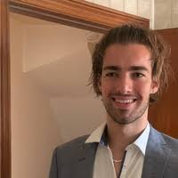 Tom L . Robert-Henault