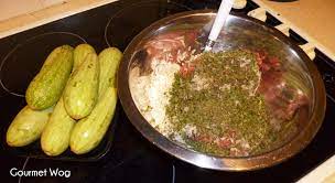 Stab the eggplant like it's julius caesar, put it in a dish to catch the juices, throw it in a toaster oven @400f for 45 minutes. Zucchini Gourmet Wog