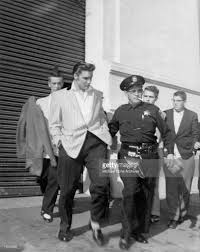 Rock And Roll Singer Elvis Presley Leaving The Oakland Auditorium Elvis Presley Young Elvis Elvis