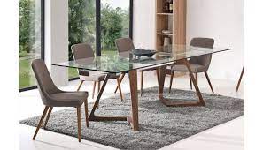 Extendable dining room tables are made from different materials. Knox Modern Glass Top Table Set