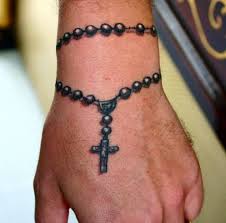 Large rosary necklaces make popular design for chest pieces. Rosary Bead Tattoo Ideas Designs And Meanings Tatring