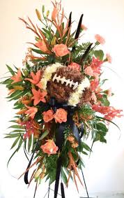 Abilene funeral home inc 3349 north 12th street. A Standing Spray For A Football Lover Funeral Flower Arrangements Funeral Flowers Sympathy Flowers