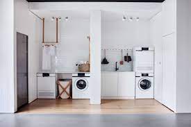 Smart Storage Solutions in an All-White Laundry Room in Melbourne - The Organized Home