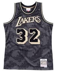 The pinstripes themselves are made from small repeating text that reads, 3x5xshowtime which represents the five championships the showtime lakers won with magic at the helm and his three Los Angeles Lakers Magic Johnson Gold Toile Swingman Jersey Lakers Store
