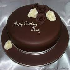 Honey Generated On Rose Chocolate Birthday Cake With Name Image Download And Share Birthday Cake With Name Cake For Husband Birthday Cake For Him Cake Writing