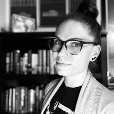 Along the Dark axis, from Grim to Noble and back. Current series is  grimdark (it's kind of hard to imagine proper cyberpunk/dystopian that  isn't) but the WIP has wandered into Nobledark territory.