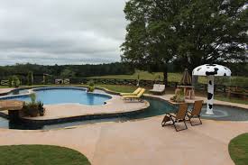A Custom Built Pool On A Southern Working Farm Lazy River With Pebble Surface Circles V Swimming Pool Renovation Backyard Vacation Swimming Pool Construction