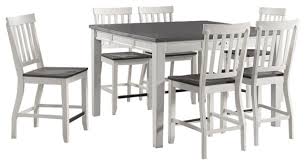 This high top dining set has a white wash finish for with a gray undertone. Picket House Jamison Two Tone Counter Height Dining Set Farmhouse Dining Sets By Picket House Houzz