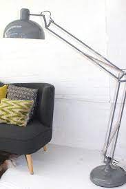 This shade is crafted from textured fabric, ideal for today's styles. Soft Grey Floor Lamp The Forest Co