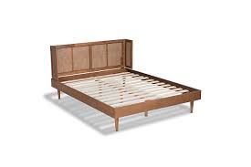 Leffler brookside upholstered bed with nail heads in lisburn rattan sophistication at its finest the brookside nailhead queen bed is an elegant piece for your bedroom. Rina Mid Century Rattan Queen Platform Bed Ashley Furniture Homestore