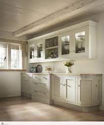 Set In A Rustic Cottage This Soft Cream Painted Shaker Kitchen Door Mixes Curved Base Units With A Sta Kitchen Design Kitchen Cabinet Styles Kitchen Renovation