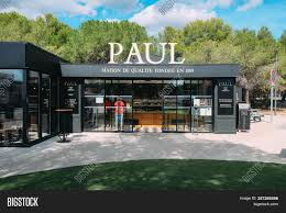 Elle participe à la mise en œuvre d'une politique d'accueil et d'insertion par l'habitat en faveur des jeunes, des familles, des seniors et des personnes en difficulté. Entrance Paul Bakery Image Photo Free Trial Bigstock