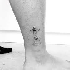 Alien Abduction Themed Simple Leg Tattoo On Gentleman Tattoos For Guys Simple Leg Tattoos Leg Tattoos