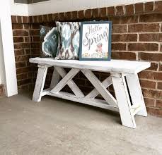 This bench also includes a storage area underneath the seat for storing outdoor items such as sporting equipment or garden tools. Diy Outdoor Bench Overalls And Power Saws Builds By Britt
