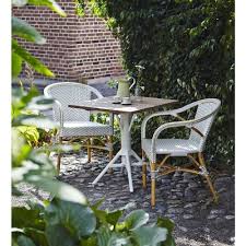 Clara Coastal Beach White And Light Brown Dotted Woven Rattan Outdoor Arm Chair In 2020 Bistro Table Outdoor Outdoor Bistro Set Outdoor Bistro Table Sets