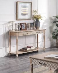 This moden, sleek, stylish, yet simple coffee side table provides both function as well as big style. Acme Furniture Ariolo Antique White Sofa Table