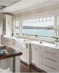 Both copper and gold add a rich warm tone to cabinet hardware. The Best 26 All White Kitchen Design Ideas Decoholic