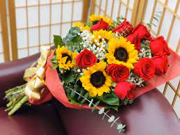 It is generally agreed that if you were to try to describe me as a flower, i would be a sunflower. Sunflowers And Roses By San Jose Flowers