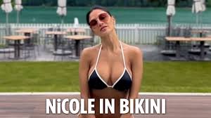 Natalie Roser looks sensational in white patterned bikini while eating an  ice cream | The Irish Sun