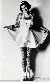 Portraits of a painted lady: Stunning vintage photos reveal the 'tramp  stamp' is not so modern phenomenon after all