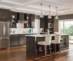 One area where it has become common is in kitchen cabinets. Grey Kitchen Walls With Dark Wood Cabinets Novocom Top