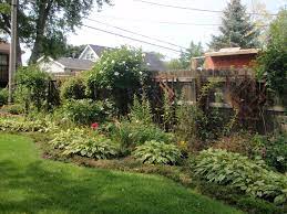 Fertilize A Lawn Jerry Baker Author Of The Impatient Gardener Suggests Mixin Outdoor Gardens Landscaping Backyard Garden Landscape Modern Garden Landscaping