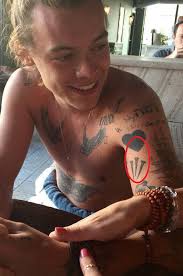 His musical career began in 2010 as a solo contestant on the british music competition series the x factor. Harry Styles 52 Tattoos Their Meanings Body Art Guru